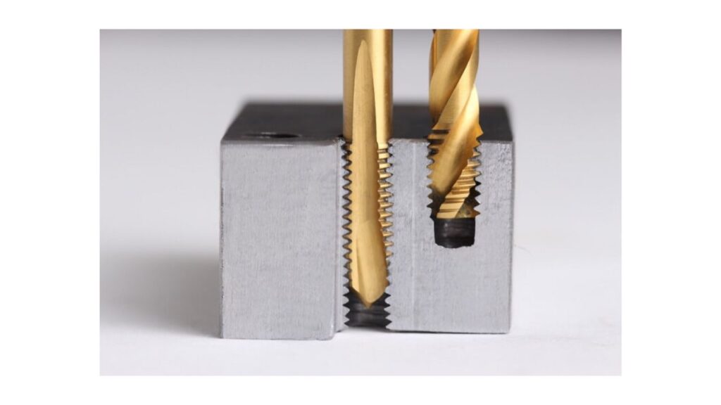 Through hole tapping
